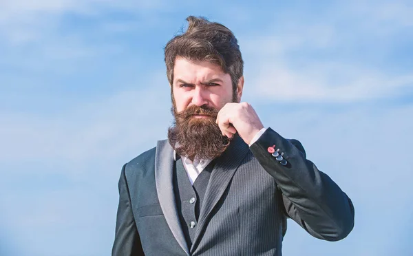 Vintage style beard. Facial hair beard and mustache care. Beard fashion trend. Start with grooming routine and ultimately lead better world. Man bearded hipster wear formal suit blue sky background