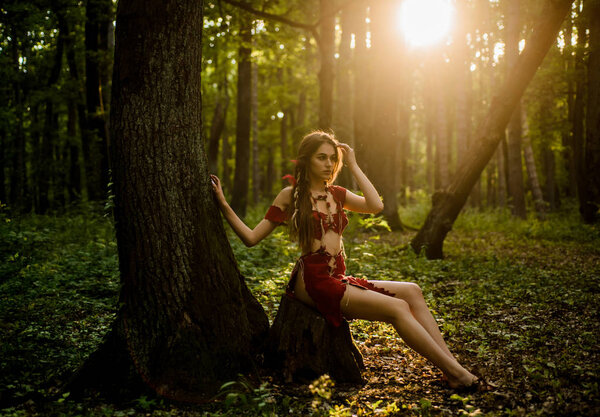 Female spirit mythology. Wilderness of virgin woods. She belongs tribe warrior women. Wild attractive woman in forest. Folklore character. Living wild life untouched nature. Sexy girl. Wild human