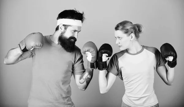 Boxing sport concept. Couple girl and hipster practicing boxing. Sport for everyone. Amateur boxing club. Equal possibilities. Strength and power. Man and woman in boxing gloves. Family battle — Stock Photo, Image