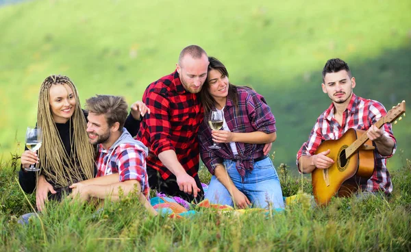 Good talk with friend. family camping. hiking adventure. happy men and girls friends with guitar. friendship. romantic picnic in tourism camp. campfire songs. group of people spend free time together — Stock Photo, Image