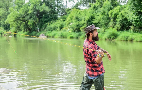 Fishing outdoor sport. Fishing hobby. Calm and tranquil. Teach man to fish. Patience and waiting. Fly fishing may well be considered most beautiful of all rural sports. Fisherman catching fish — Stock Photo, Image