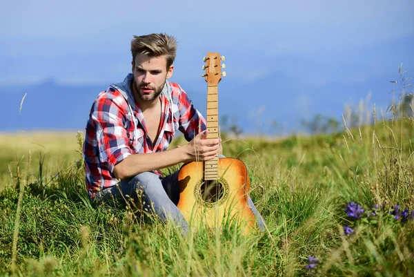 Let the Music Take You Away. western camping and hiking. cowboy man with acoustic guitar player. sexy man with guitar in checkered shirt. country music song. hipster fashion. happy and free — Stock Photo, Image