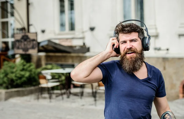 Music chart. Let the music speak. Emotional man with headphones listening music. We love music. Mature hipster with beard. Bearded man. brutal caucasian hipster with moustache. Hipster fashion