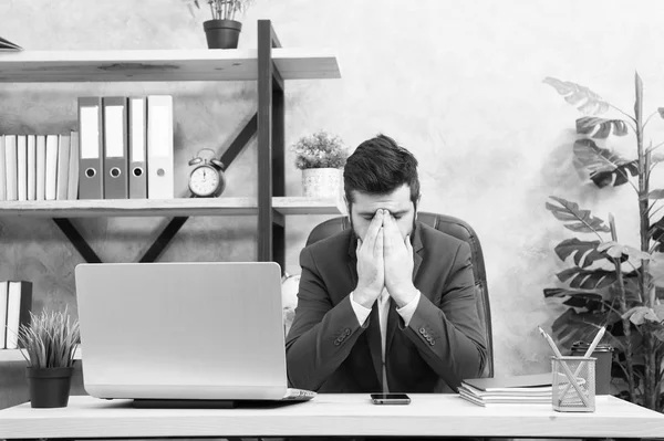 Desperate situation. Man bearded boss sit office with laptop. Manager solving business problems. Businessman in charge of successful business solutions. Developing business strategy. Risky business