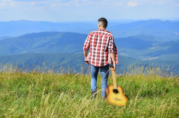 Play What you Want. western camping and hiking. happy and free. cowboy man with muscular torso. acoustic guitar player. country music song. sexy man with guitar in checkered shirt. hipster fashion