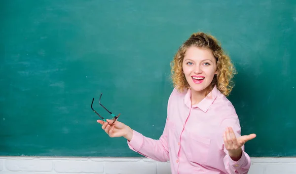 Learn discipline and punctuality from school teacher. High demanding educator. Learning progress. Woman school teacher chalkboard background. School staff concept. Developing cognitive process