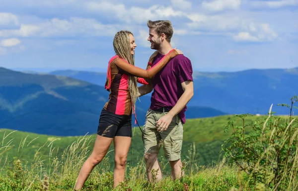 Couple in love summer vacation. Journey to mountains concept. What is our next travel destination. Two hearts full of love. Honeymoon in highlands. Love and trust. Couple landscape background