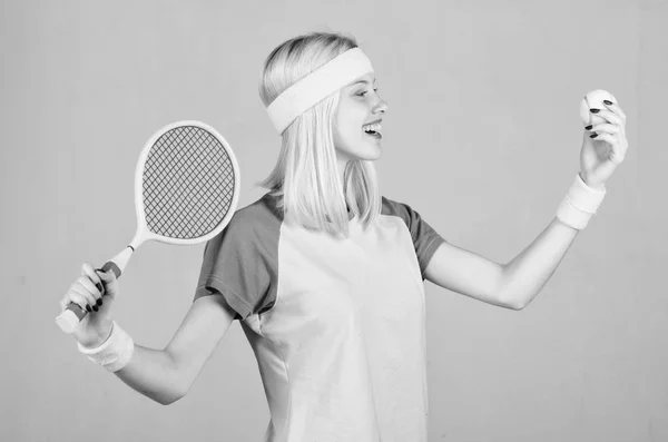 Girl adorable blonde play tennis. Start play game. Sport for maintaining health. Athlete hold tennis racket in hand. Tennis club concept. Tennis sport and entertainment. Active leisure and hobby