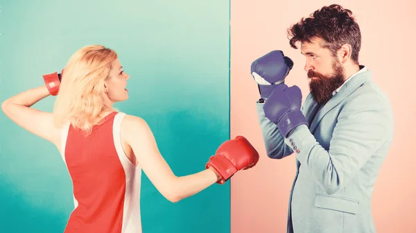 Gender equality. Man formal suit and athletic woman boxing fight. Couple in love competing in boxing. Female and male boxers fighting in gloves. Domination concept. Gender battle. Gender equal rights — Stock Photo, Image
