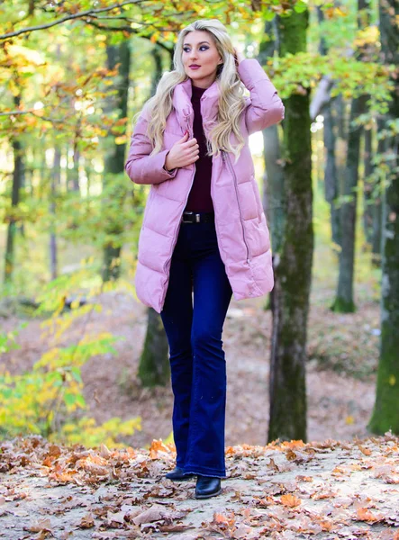 How to rock puffer jacket like star. Puffer fashion concept. Outfit prove puffer coat can look stylish. Girl fashionable blonde walk in park. Jackets everyone should have. Best puffer coats to buy