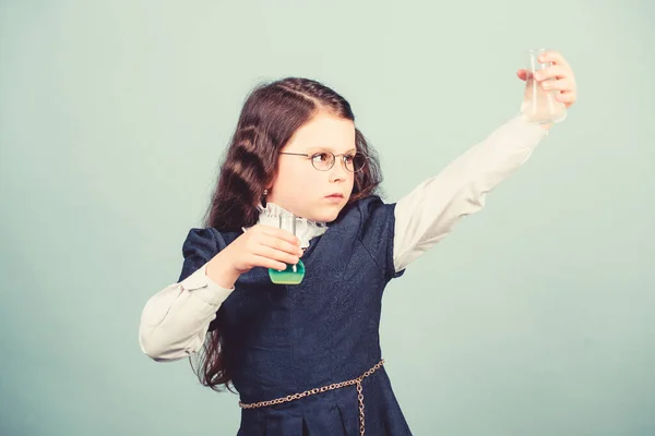 Child study bilogy lesson. Discover future. small girl scientist with testing flask. education and knowledge. science research in lab. Small genius girl. back to school. With chemistry, i can — Stock Photo, Image