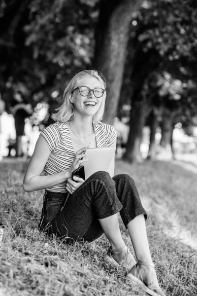 United with nature. Summertime concept. Take break and relax. Simple happiness. Closer to nature. Nature inspiring environment. Girl carefree student worker laptop relaxing outdoors sit green grass