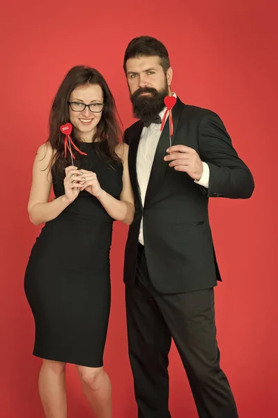 formal couple. business meeting. tuxedo man and formal woman at formal party. sexy couple in love. valentines day heart. bearded businessman with formal lady. love date and romance. business couple