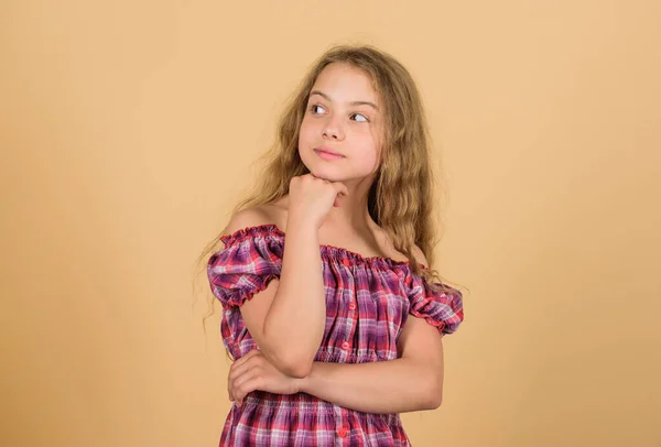 Playful mood. Child cute thinking. Girl make decision or choice. Hard decision for her. Thoughtful girl busy with hard decision. Cunning face. Maybe concept. Kid thoughtful dreamy face make decision — ストック写真