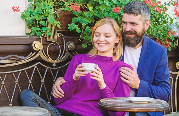 Married lovely couple relaxing together. Travel and vacation. Explore cafe and public places. Couple cuddling cafe terrace. Couple in love sit cafe terrace enjoy coffee. Pleasant family weekend — Stock Photo, Image