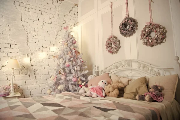 Merry Christmas and Happy Holidays. Christmas composition. Happy new year. Christmas. Beautiful decorated room with tree and toys. The morning before Xmas. New year holiday. Christmas interior