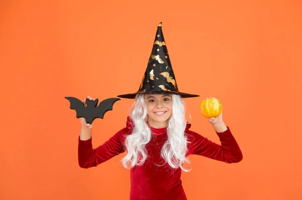 Little child in witch costume. Halloween party. Small girl in black witch hat. Autumn holiday. Join celebration. Magical spell. Small witch with white hair. Wizard or magician. Halloween attributes — Stock Photo, Image
