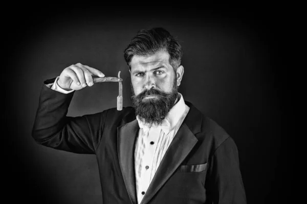 Sharp blade. Grow mustache. Growing and maintaining moustache. Man with mustache. Beard and mustache grooming. Hipster handsome bearded wear tuxedo. Barber shop concept. Shaving dangerous blade
