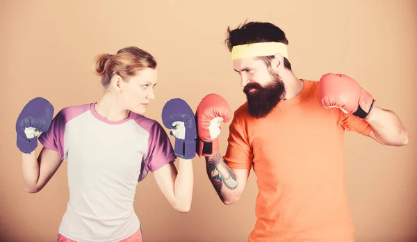 Boxing sport concept. Couple girl and hipster practicing boxing. Sport for everyone. Amateur boxing club. Equal possibilities. Strength and power. Man and woman in boxing gloves. Family battle — Stock Photo, Image