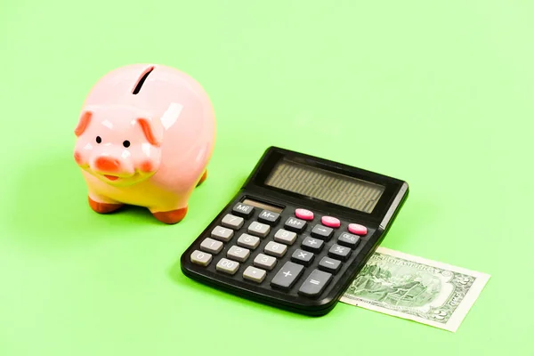 Planning and counting budget. moneybox with calculator. Piggy bank. income capital management. bookkeeping. financial problem. money saving. Accounting and payroll. Taking money — Stock Photo, Image