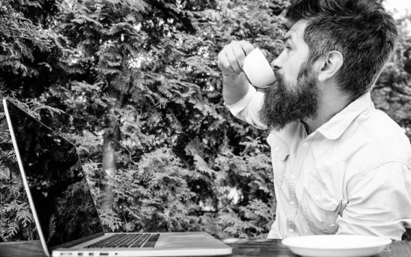 perfect deal. brutal bearded hipster at coffee break. agile business. Business success. office worker. Successful businessman. happy man working on laptop. Great job. Good deal