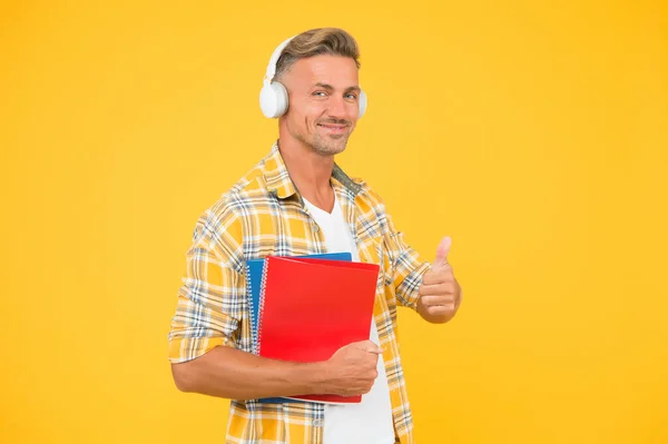 Another way of study. Learning english. Educational technology. Study. Audio book concept. Worldwide knowledge access. Audio library. Man handsome college student headphones books. Study languages — Stock Photo, Image