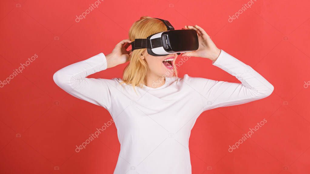 Woman watching virtual reality vision. Woman with virtual reality headset. The woman with glasses of virtual reality. VR vision.