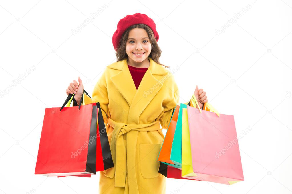 Survived Black Friday. Happy small child hold shopping bags. Little girl after Black Friday sale. Enjoy Black Friday shopping. Black Friday deals and discounts. Shopping day after Thanksgiving