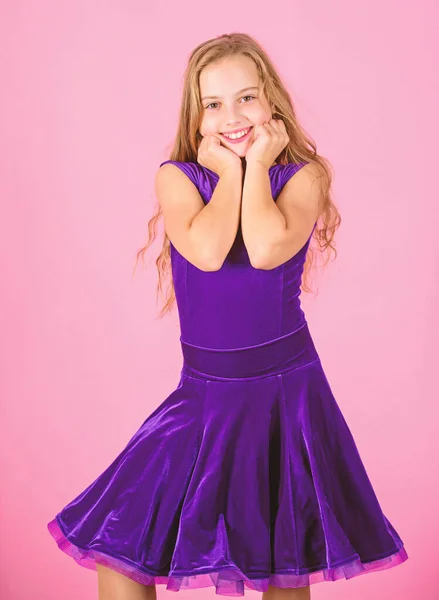 Clothes for ballroom dance. Ballroom dancewear fashion concept. Kid dancer satisfied with concert outfit. Kids fashion. Kid fashionable dress looks adorable. Girl cute child wear velvet violet dress