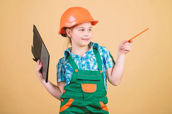 Build your future yourself. Initiative child girl hard hat builder worker. Child care development. Safety expert. Foreman inspector. Builder engineer architect. Future profession. Kid builder girl