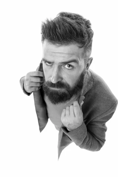 For a refined fashionable look. Bearded man wearing fashionable topcoat and jeans. Having fashionable wardrobe. Hipster with fashionable mustache and beard style keeping arms crossed — Stock Fotó