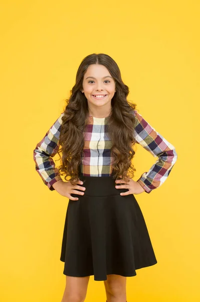 Fashion never goes out of school. Little schoolchild in formal fashion yellow background. Small vogue model with fashion look. Stay in fashion be happy. Back to school — Stock Photo, Image