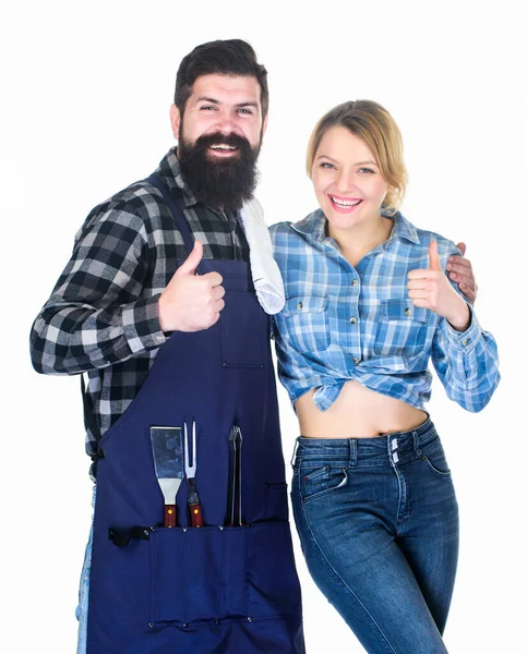 Made right choice. Couple in love hold kitchen utensils. Man bearded hipster and girl. Preparation and culinary. Picnic barbecue. food cooking recipe. Tools for roasting meat. Family weekend — Stock Photo, Image