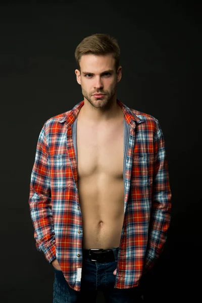 Attractive and desirable. Sexy worker. Man sexy muscular torso wear checkered shirt. Western style. Macho on black background. Handsome man with beard. Male fashion. Casually sexy. Feeling confident — Stock Photo, Image