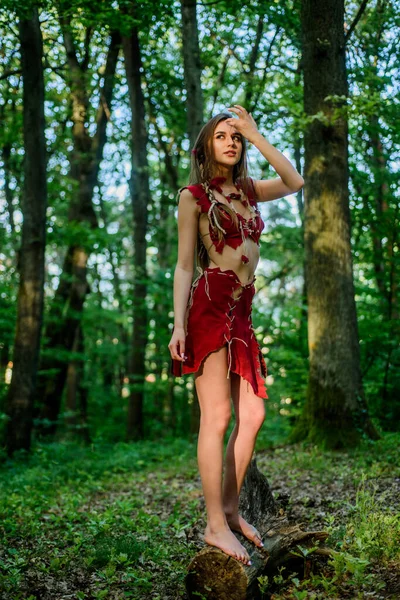 the woman went hunting. cougar female. wild woman in forest. ethnic tribal fashion. deep forest. sexy girl in leather suede clothes. amazon woman. sexy witch. Unpassable to resist