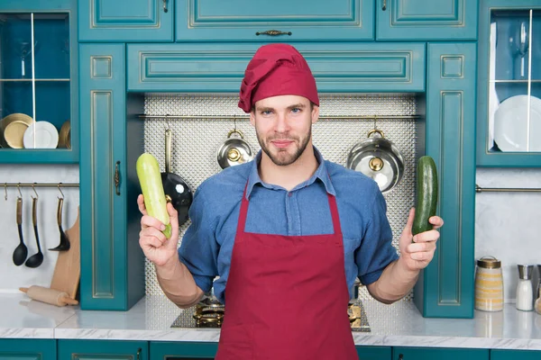 Fresh veggies. Handsome cook in kitchen. Chef following recipe. Cooking dinner with traditional recipe. Preparing meal. Healthy food. Professional kitchen. Traditional cuisine. Man at kitchen concept — Stock Photo, Image