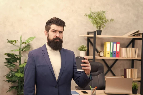 office life. serious businessman in formal outfit. Confident man use laptop. Boss workplace. modern office. Coffee break. Bearded man in business office. office dress code. great business meeting