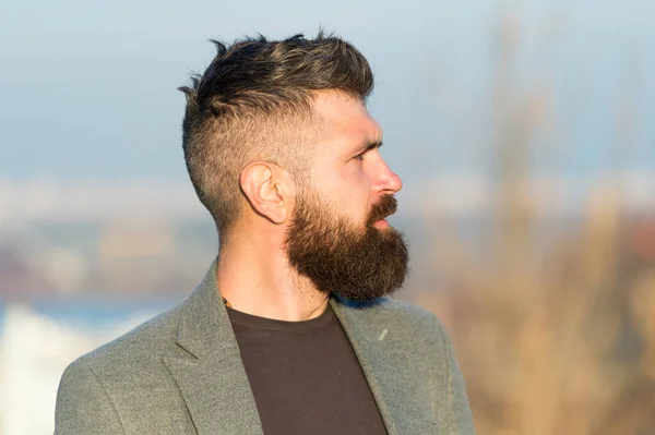 Fresh haircut. Man bearded hipster with mustache blue sky background. Beard grooming guide. Hipster serious handsome attractive guy with long beard. Barber hairdresser salon. Guy stylish long beard — Stock Photo, Image