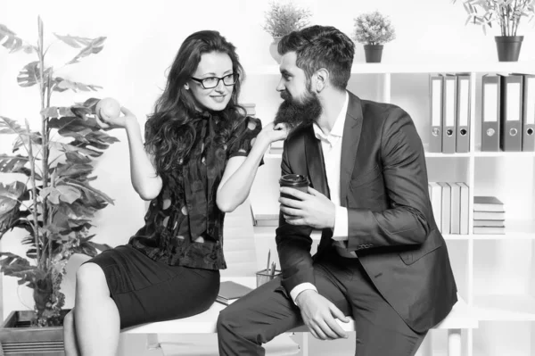 Its just a harmless flirt. Romantic couple conducting workplace affair. Boss and secretary having romantic relationship. Romantic love of bearded man and sexy woman in office. Romantic partnership — Stock Photo, Image