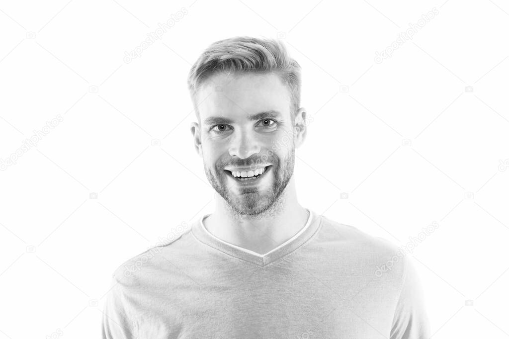 Give more care for bearded hair. Bearded man isolated on white. Happy bearded guy. Unshaven model with bearded face. Beard products. Shaving salon. Barbershop. At barbers