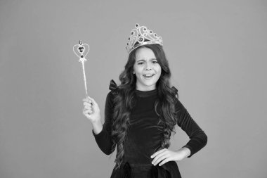 Magic stick concept. Cute kid doing magic. Amazing miracles. Little child long hair. Happy childhood. Halloween holiday. Magical transformation. Imagine. Want to see my super power. Magic trick