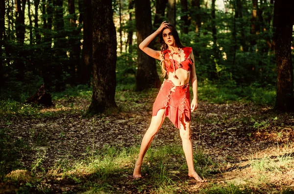 Erotic games. wild woman in forest. fairitale. pocahontas costume woman. amazon instinct. sexy girl in leather clothes. deep forest fairy. mystic forest. primary witch. cougar female. tribal clothing — Stock Photo, Image