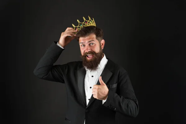 thumb up for success. Party king. be vip client. Premium user concept. reward for business success. Top manager. King of style. bearded man in gold crown. elegant man in formal wear at special event