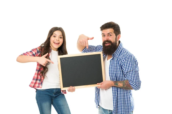 Daughter study at home with father. information you need. dad and child pointing finger on copy space. happy family presenting product. we recommend this. happy to be back to school — Stock Photo, Image
