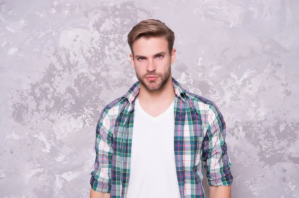 Guy looking his best. Man abstract background. Handsome man in casual style. Unshaven man with beard hair. Barbershop. Caucasian man wear plaid shirt. Fashion and style. Be yourself