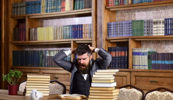Man in classic suit or professor with bored face sits — Stock Image Man in classic suit or professor with bored face sits Stock Picture