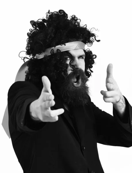 Caucasian hipster in suit and black curly tie-tied afro wig — Stock Photo, Image