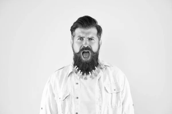 Facial care. love care my beard hair. laundry. hair drying. barbershop. man clothespin on beard. brutal male put clothespin with hearts on beard. bearded man hipster casual style. valentines day — Stock Photo, Image