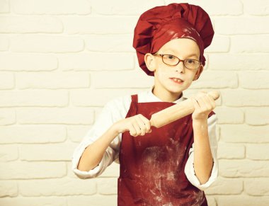 Lekeli, sevimli aşçı aşçı aşçı Boyon duvarlı arka plan