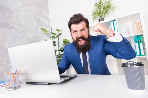 Control your anger. Angry realtor shout showing fist. Bearded man got angry in office. Feeling angry. Bad mood. Business stress. Modern life. Job makes him angry